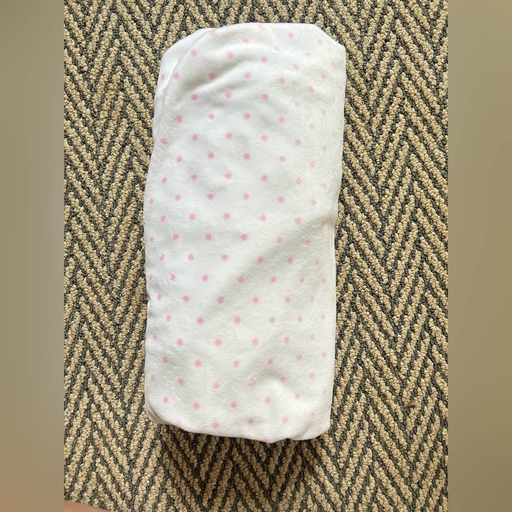 Pottery Barn Kids pink and white polka dot crib sheet